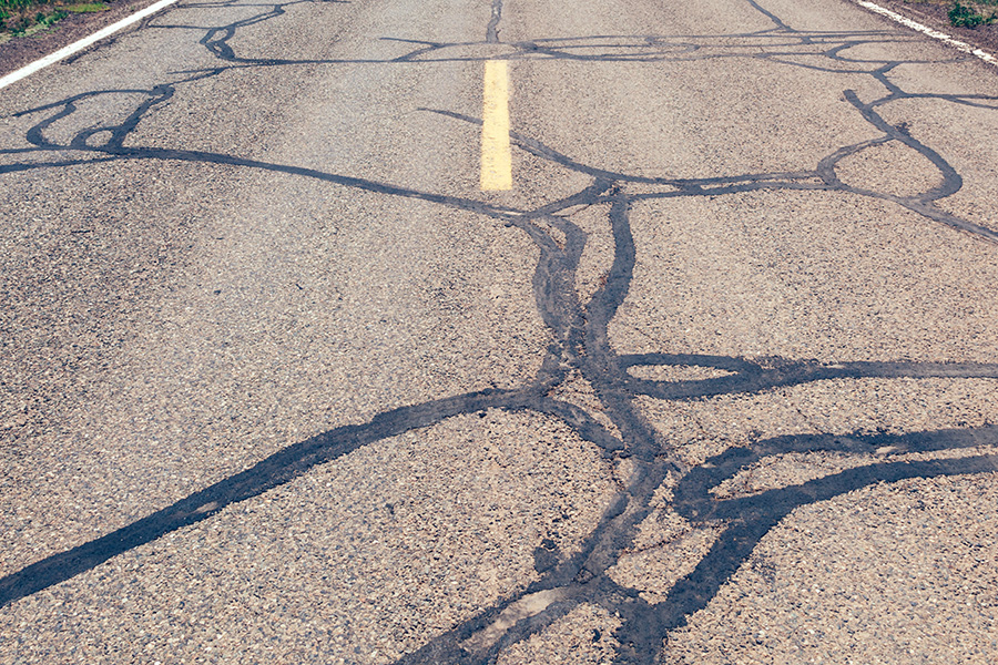asphalt pavement that has recently had crack filling complete